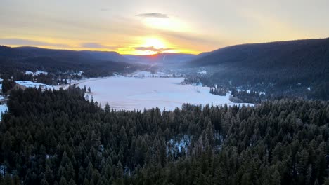 Breathtaking-Winter-Sunrise-above-Cariboo-Region-Forest's-and-Farmland-in-British-Columbia