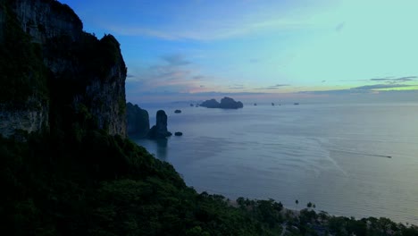 Drone-filming-the-stone-cliffs-in-Ao-Nang,-Krabi,-Thailand