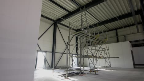 The-inside-of-a-construction-building-with-scaffolding-inside