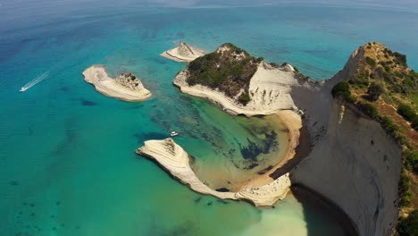 Experience-the-breathtaking-beauty-of-Cape-Drastis-in-Corfu,-Greece-aerial-footage