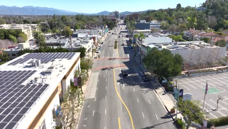 Drone-follows-a-car-cruising-along-the-famous-Ventura-Boulevard-in-Encino-Neighborhood
