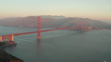 Aerial-slider-shot-of-the-Golden-Gate-bridge-at-sunrise
