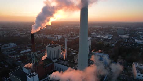 Smoke-emitting-Coal-fired-Power-Plant-At-Sunset-In-Brunswick,-Germany,-Releasing-Harmful-Pollutants-Into-The-Air
