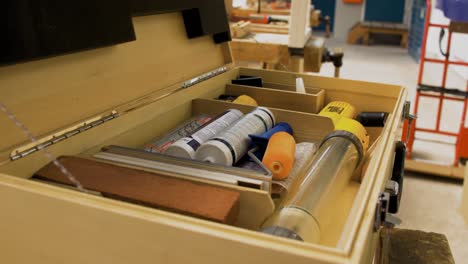 construction-tools-inside-a-wooden-suitcase