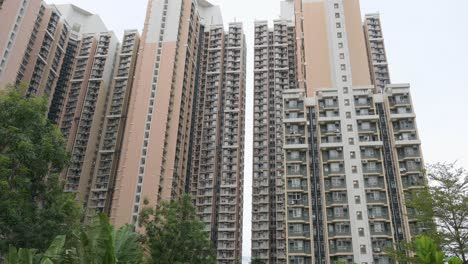 Tilting-shot-of-a-high-rise-public-housing-apartment-building-complex-in-Hong-Kong
