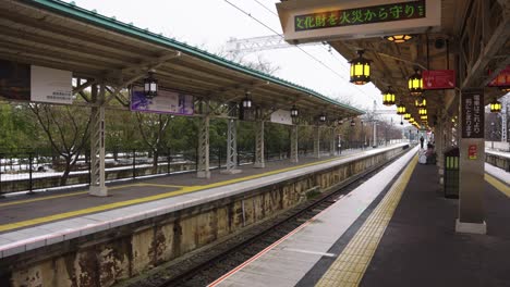 Arashiyama-Hankyu-Station,-Train-Station-Platform-in-Winter