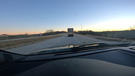 Driving-on-Interstate-at-sunset-in-rural-Midwest