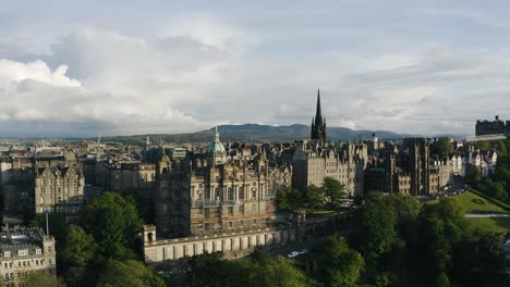 Aerial-view-of-Edinburgh's-Museum-on-the-Mound-with-sunlight-casting-warm-light-on-the-downtown-buildings