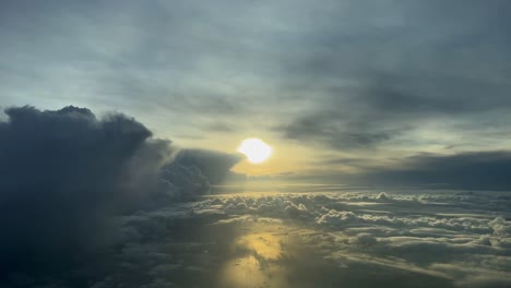 Awesome-aerial-view-recorded-from-a-jet-cockpit,-pilot-point-of-view,-o-a-stormy-sky-just-after-sunrise,-descending-to-Bari-airport,-in-southern-Italy,-over-the-Adriatic-sea