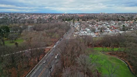 Aerial-Over-Kissena-Park-In-The-Neighborhood-Of-Flushing-During-Late-Winter-In-Queens,-New-York