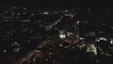 Victoria-Island,-Lagos-Nigeria--December-20-2022:-Cityscape-of-Victoria-Island-at-Night-time-with-traffic,-a-luxurious-business-and-residential-district-in-Lagos