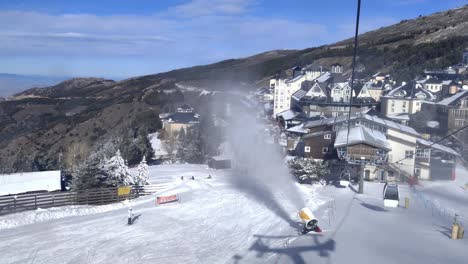 Rising-aerial-shot-of-a-snow-machine-letting-out-fresh-snow-at-Sierra-Nevada-Resort