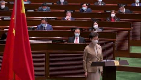 Former-Hong-Kong-Chief-Executive-Carrie-Lam-presides-next-to-the-People's-Republic-of-China-flag-while-is-seen-speaking-during-the-oath-taking-ceremony-at-the-Legislative-Council-main-chamber
