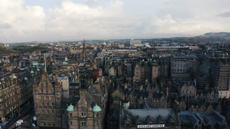 Establishing-aerial-view-of-Edinburgh's-old-gothic-architecture-sprawling-throughout-the-downtown-area