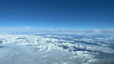 Spectacular-view-of-the-Italian-Alps,-recorded-from-a-jet-cockpit-flying-northbound-at-10000m-high