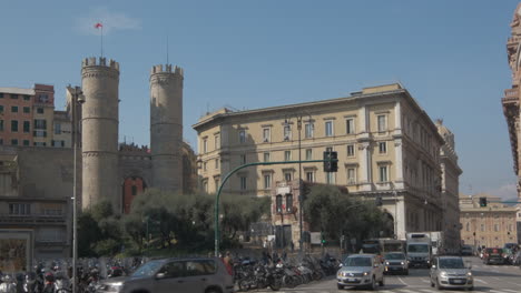 Genoa-Porta-Soprana-medieval-wall-gate-and-Cristoforo-Colombo-house-birthplace-in-Piazza-Dante-square