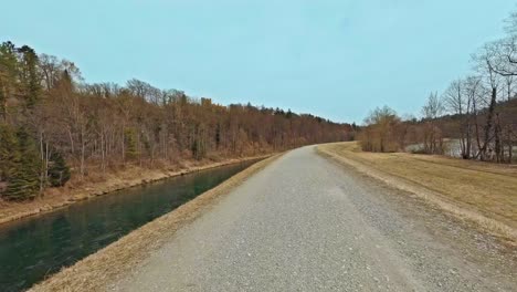 Rural-bike-trip-along-the-popular-Isar-river-in-southern-bavaria-from-drivers-fpv-view-at-a-beautiful-day