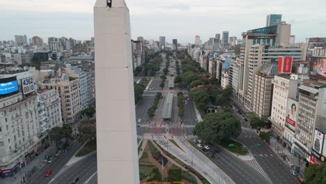 Drone-Flying-Towards-The-Obelisk-Of-Buenos-Aires,-National-Historic-Monument-And-Icon-At-The-Intersection-In-Plaza-de-la-Republica,-Buenos-Aires,-Argentina