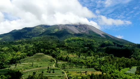 Majestic-active-volcano-Mount-Merapi,-Indonesia-hidden-in-clouds,-timelapse