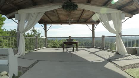 Gorgeous-outdoor-wedding-altar-overlooking-the-Gatineau-Hills-at-Le-Belvédère-events-center-in-Wakefield,-Quebec
