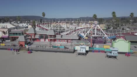 Colorful-Amusement-Park-On-Beach-California,-USA,-Aerial-Establishing