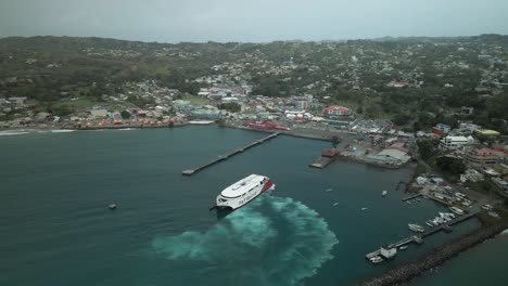 Aerial-view-of-the-city-of-Scarbourough-while-a-passenger-ferry-docks-in-the-port