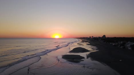 Idyllic-Sunset-Beach-In-Monte-Hermoso,-Argentina---aerial-drone-shot
