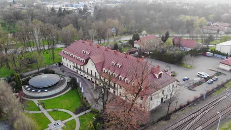 Boutique-hotel-in-renovated-historic-building-aerial-view,-Wieliczka,-Poland