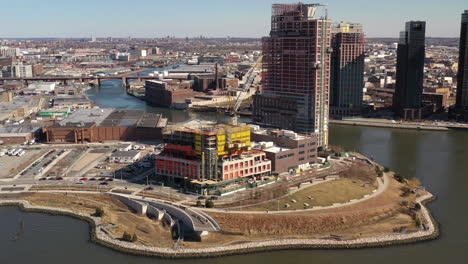 An-aerial-view-over-the-East-River-facing-Long-Island-City-on-a-sunny-day