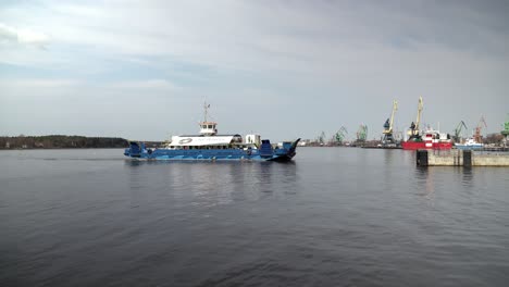 Ferry-Docks-in-Harbour-with-Klaipeda-Loading-Terminal-in-Background