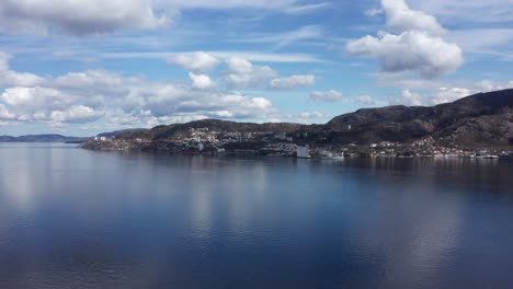 Forward-moving-Aerial-of-Eidsvaagneset-outside-Bergen---Beautiful-weather-and-sky---Norway