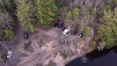 Vehicles-Park-At-Lakeshore-In-Leota,-Michigan-For-Overlanding-Camping