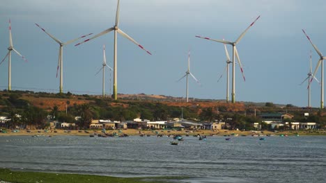 Wind-Turbines-Standing-By-The-Beach-In-Son-Hai,-Vietnam