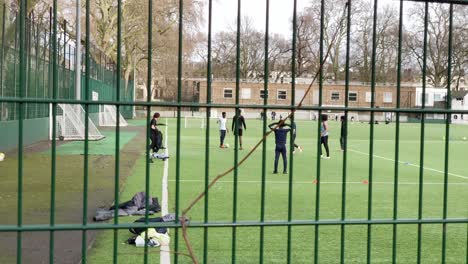 Black-kids-playing-football-in-an-urban-area