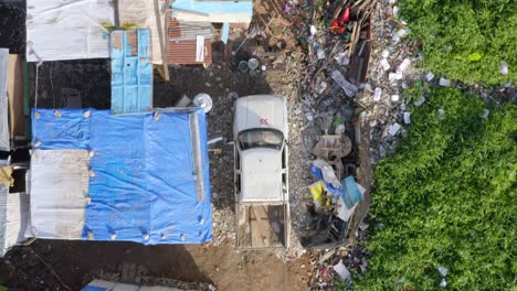Poverty-and-garbage-along-Ozama-river,-Santo-Domingo