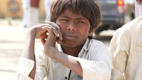 Young-Poor-Male-Child-Looking-At-Camera-In-Tharparkar-In-Pakistan