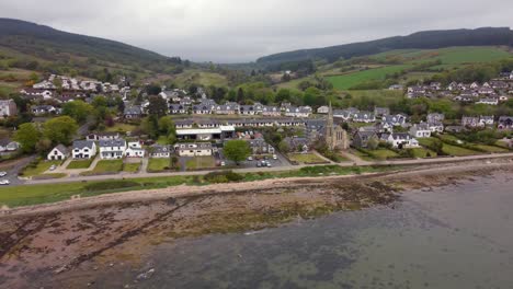 Aerial-view-of-the-Scottish-town-of-Lamlash-on-the-Isle-of-Arran-on-an-overcast-day,-Scotland