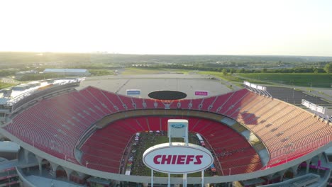 Drone-Flying-Away-from-Kansas-City-Chiefs'-Football-Stadium-at-Golden-Hour