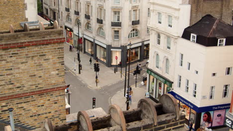 Rooftop-aerial-view-looking-down-on-Oxford-Street-in-London-as-people-shop