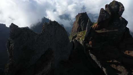 Drone-shot-flying-sideways-over-the-peaks-of-Pico-das-Torres-in-Madeira