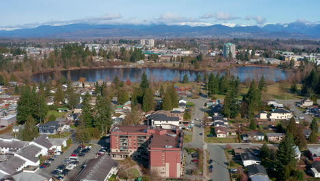 A-Stunning-Aerial-Shot-of-Mill-Lake-Park-in-Central-Abbotsford-BC-Canada-on-a-Sunny-Day