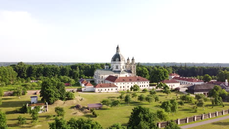 Pazaislis-monastery-complex-building-with-majestic-dome-in-ascending-drone-view