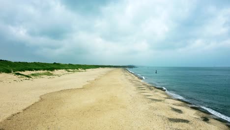 Beautiful-landscape-shot-of-a-typical-British-sand-beach-with-no-people