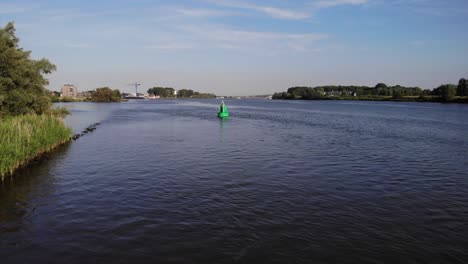 Aerial-Flying-Over-Oude-Mass-To-Floating-Green-Buoy
