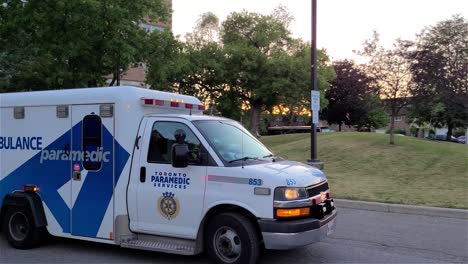 An-ambulance-van-driving-out-from-the-neighborhood