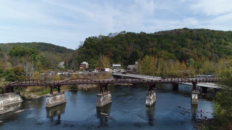 A-reverse-flyover-view-of-the-Youghiogheny-River-in-Ohiopyle,-Pennsylvania