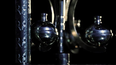 close-up-macro-of-an-old-clock-pendulum-clockwork-gear