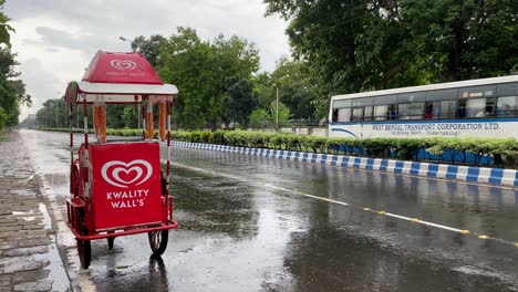 Kwality-Walls-ice-cream-stall-at-the-empty-road-of-Kolkata-during-monsoon-season-due-to-covid-lockdown