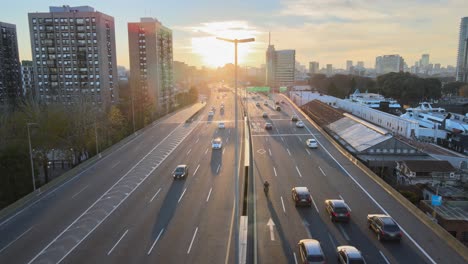 Static-aerial-of-trafficked-highway-through-Buenos-Aires-at-sunset