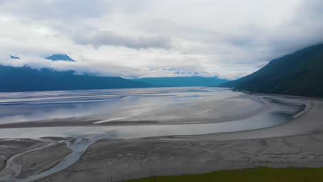 4K-Cinematic-Drone-Video-of-Mountains-Overlooking-Turnagain-Arm-Bay-at-Low-Tide-Near-Anchorage,-AK